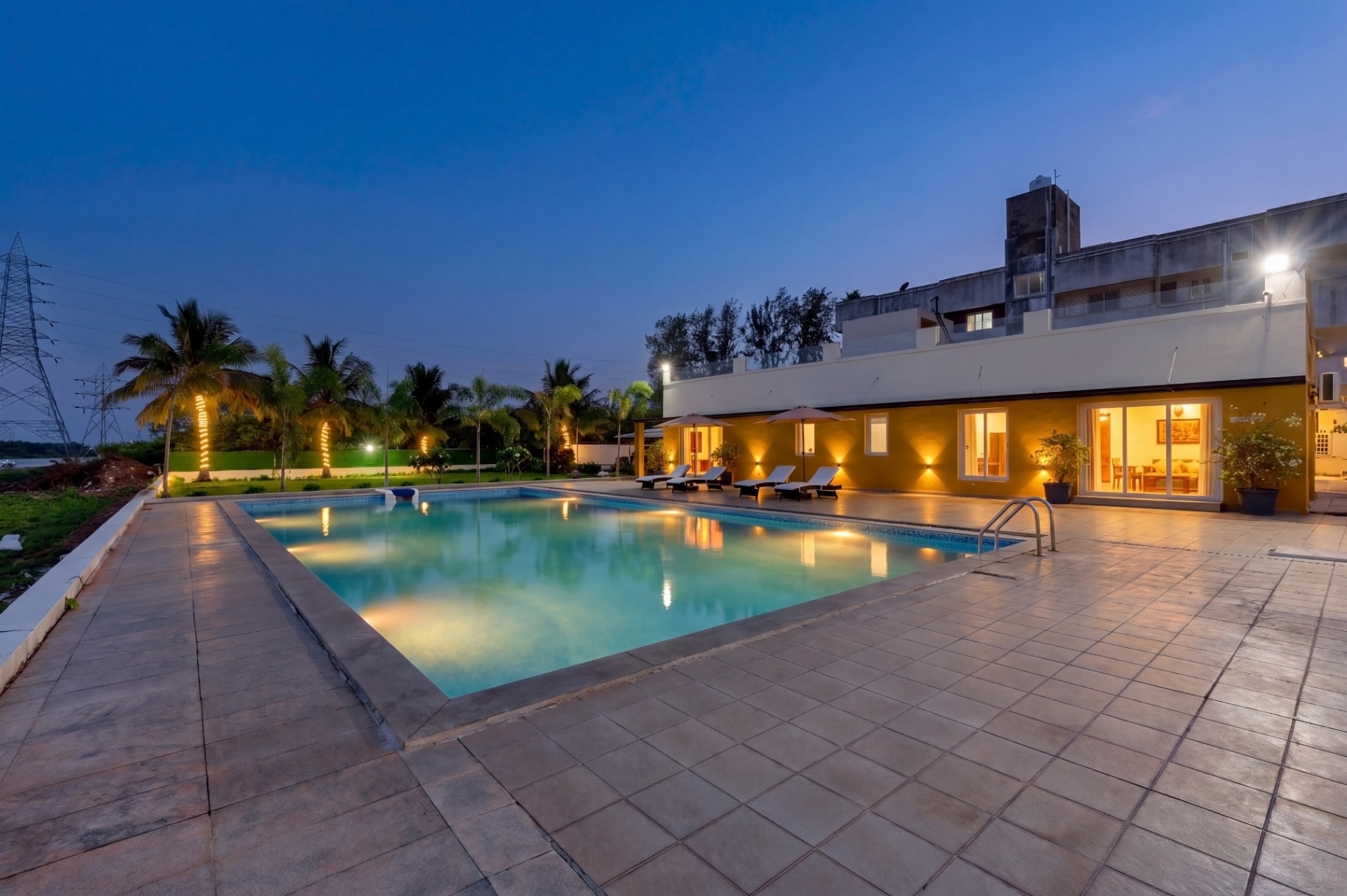 Lynwood pool illuminated at night